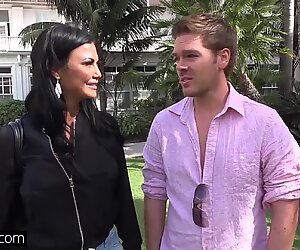 Jasmine Jae is a hot MILF with big tits and a pierced clit. The trio go to the beach where Jasmine exposes her pussy for the public to see!