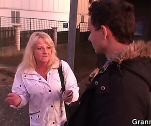 70 years senior skinny granny in stocking riding