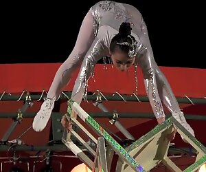 GORGEOUS CHINESE GIRL PERFORMING DEATH DEFYING STUNT